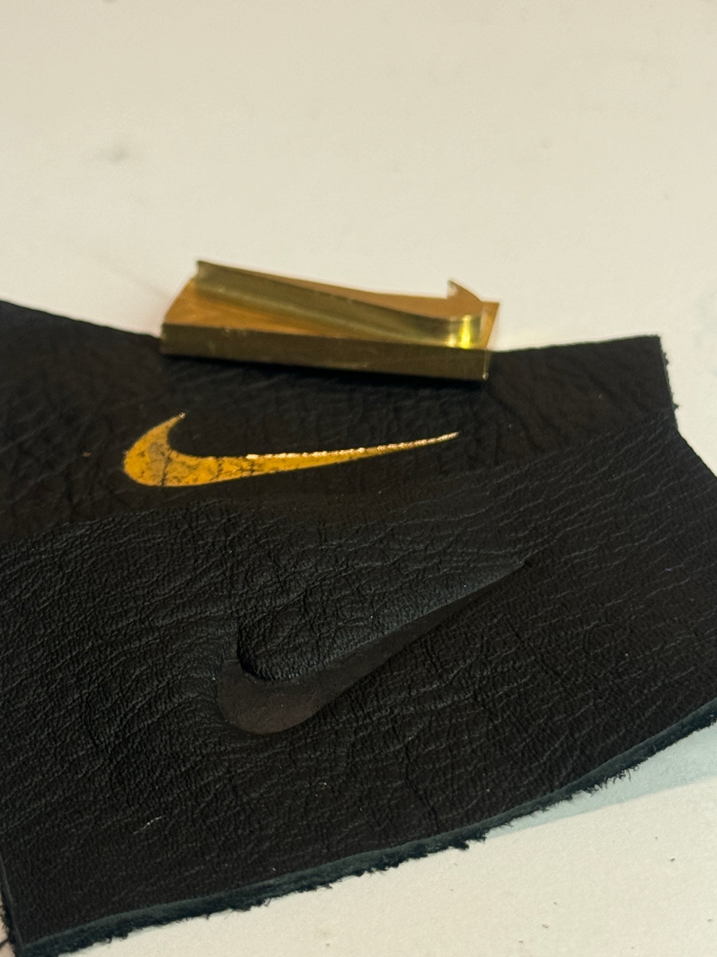 Mini swoosh brass stamps